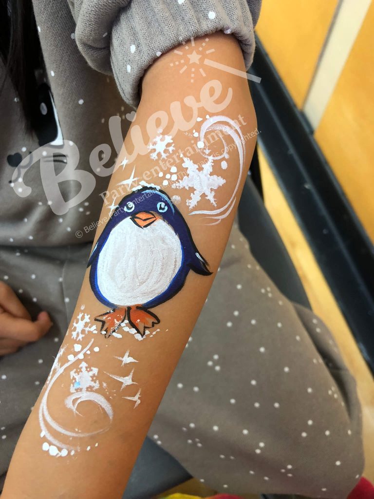 Penguin Face Painting on Arm for Childrens Birthdays