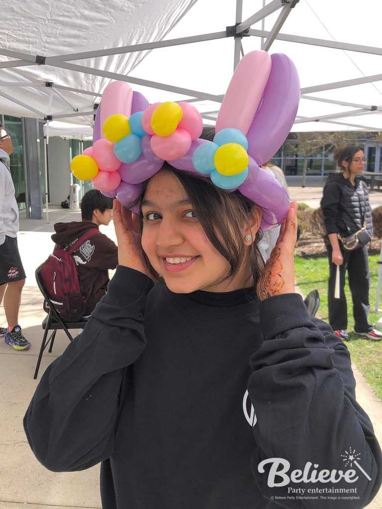 Bunny hat balloon twisting