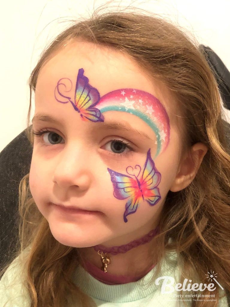 Butterfly and rainbow face painting for kids