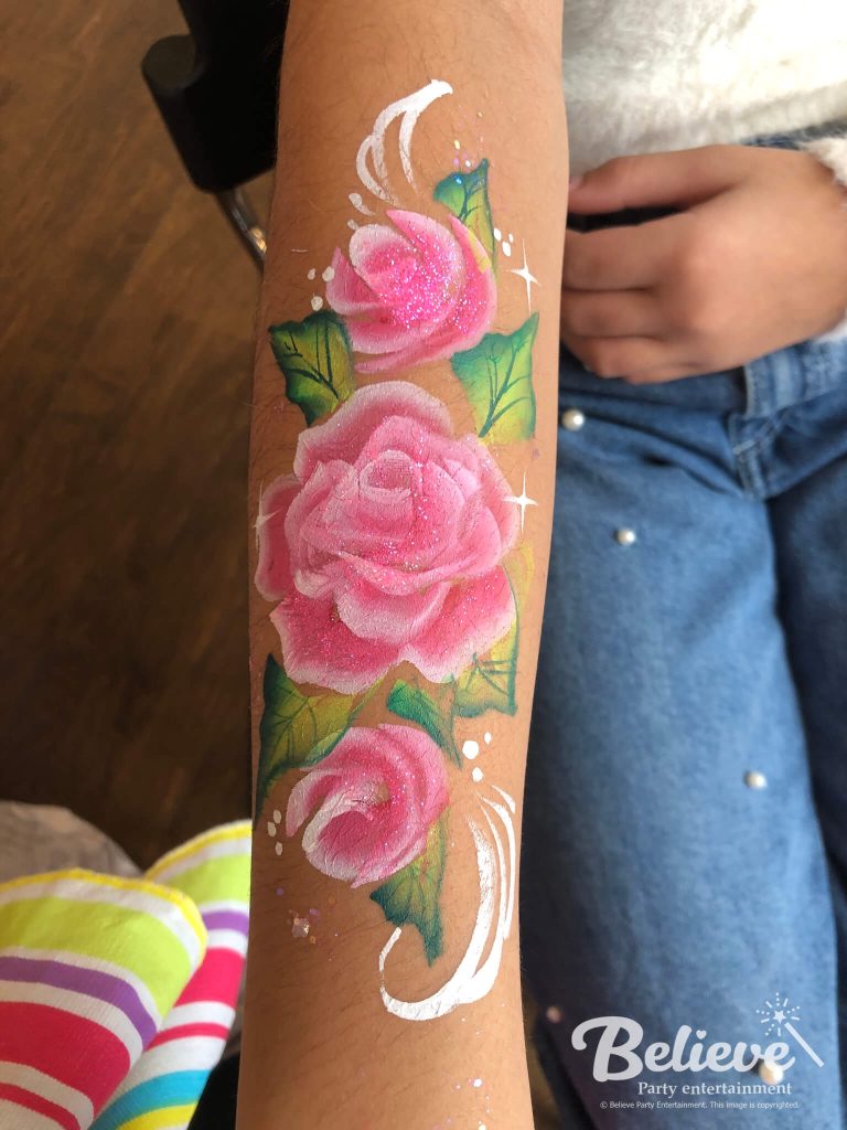 Roses arm and face painting for kids