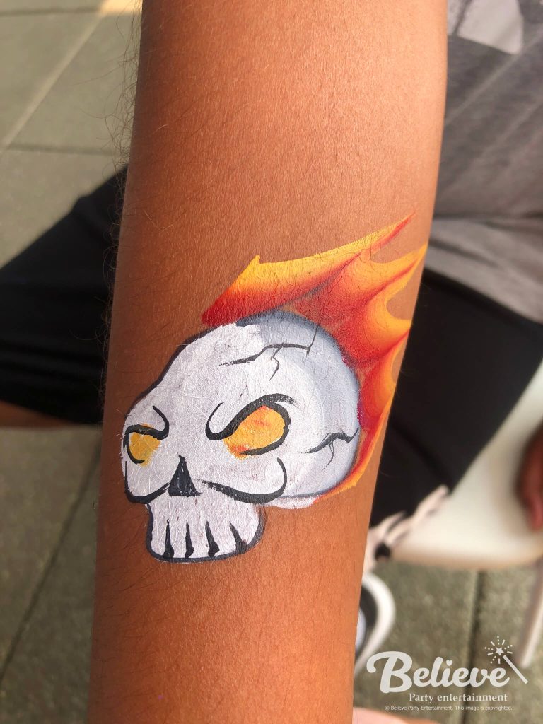 Flaming skull arm and faece painting